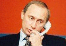 Путин говорит по телефону. Фото ИТАР-ТАСС