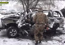 Взорванный в Луганске автомобиль. Кадр видеозаписти