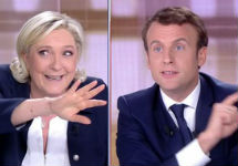 Ле Пен и Макрон: кадр теледебатов