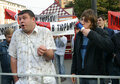 Заводилы задирают через штакетник митингующих. Фото Дм.Борко/Грани.Ру
