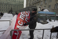 Шествие 4 февраля. Полиция и пропутинский баннер. Фото Е.Михеевой/Грани.Ру