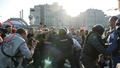 Продолжается толкотня, Гущин стоит в стороне. Кадр видеозаписи "184 задержания" из "Болотного дела"