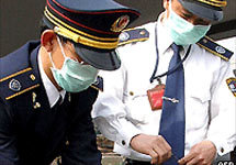 Влати  Китая  в борьбе с атипичной пневмонией. Фото  BBC.