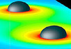 Бинарная система черных дыр. Черные сферы обозначают поверхность так называемого "горизонта событий" черных дыр, при пересечении