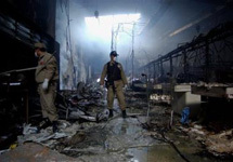 Развалины сгоревшего супермаркета в Асунсьоне. Фото АР