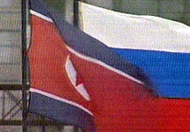 Флаги КНДР и России. Кадр Первого канала