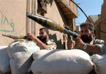 Иракские повстанцы в эн-Наджафе. Фото АР