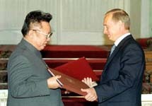 Владимир Путин и Ким Чен Ир. Фото АР