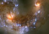 Сталкивающиеся галактики, носящие название "Антенны" (NGC4038/4039), находящиеся от нас на расстоянии 60 миллионов световых годо