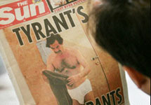 Фотографии Саддама Хусейна в Sun. С сайта news.yahoo.com