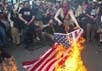 Сожжение американского флага. Фото http://hammeroftruth.com