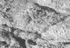 Изучая новые снимки Энцелада, сделанные с рекордно близкого расстояния, ученые приходят в полное недоумение и пока не понимают, что они видят. Гигантские валуны смотрятся на этом крупноплановом снимке Энцелада как белые пятна. Фото NASA/JPL