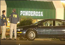 Место преступления у ресторана Ponderosa Steak House. Фото АР