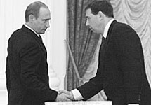Владимир Путин и Андрей Илларионов. Фото "Коммерсанта"