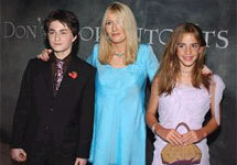 Daniel Radcliffe, who plays Harry Potter (news - web sites), left, with author JK Rowling, center, and co-star Emma Watson as th