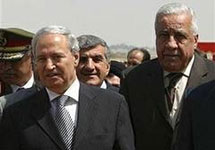 Вице-президент Сирии Фарук аль-Шара (слева). Фото AFP
