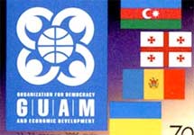 Эмблема ГУАМ и флаги его членов