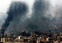Пригород Бейрута. Дым на снимке ''клонирован''. Фото Reuters