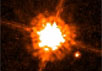 CHXR 73 A и B: красный карлик и объект массой в 12 юпитеров. Фото: NASA, ESA and K. Luhman с сайта hubblesite.org