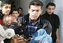 Бейт-Ханун. Раненый палестинский мальчик. Фото АР