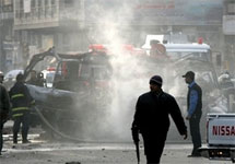 Взрыв автобуса в Багдаде. Фото АР