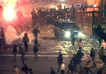 Беспорядки в Италии. Фото с сайта Yahoo.com