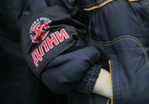 Эмблема ДПНИ на рукаве куртки. Фото Д.Борко/Грани.Ру