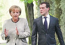 Ангела Меркель и Дмитрий Медведев. Фото РИА ''Новости''