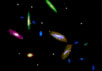 14 галактик, изученных в Wise Observatory. Размеры их искусственно завышены, цвета - условные. С сайта http://wise-obs.tau.ac.il/