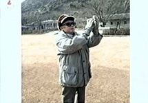 Фотография Ким  Чен Ира. Кадр северокорейского телевидения
