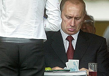 Владимир Путин считает деньги. Фото www.socionics.org