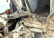 Обрушение стены здания. Фото NEWSru.com