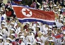 Болельщики из КНДР. Фото с сайта www.sport.bigmir.net