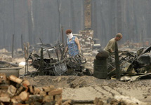 На пепелище. Фото с сайта www.epochtimes.ru