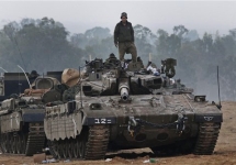 Израильский танк у границы сектора Газы. Фото: AP Photo/Lefteris Pitarakis