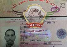 Паспорт Константина Журавлева с наклейкой "Лива-ат-Таухид". Фото @p_vanostaeyen