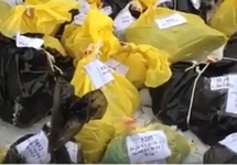 Мешки с останками погибших в первой чеченской войне. Кадр видео с ФБ-страницы Асет Мальсаговой