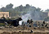 Место падения американского вертолета, сбитого в воскресенье под Эль- Фаллуджей. Фото АР