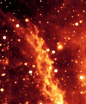 Туманность в центре Млечного пути в виде двойной спирали. Фото NASA/JPL-Caltech/UCLA с сайта newsroom.ucla.edu