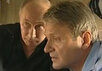 Владимир Путин и Александр Ткачев в вертолете над зоной бедствия. Кадр Первого канала