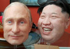 Маски Путина и Ким Чен Ына. Кадр видео 