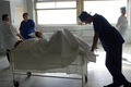 Перевозка больных из реанимационного отделения, где работает Андрей. Фото Дм.Борко/Грани.Ру