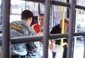 В автозаке. Омоновец и две неизвестные девушки в секции для охраны. Фото Анастасии Рыбаченко