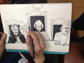 Художница Виктория Ломаско рисует судей Таисии Осиповой. Фото из твиттера "Новой газеты"