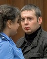 Потерпевший омоновец Иван Круглов и прокурор Костюк в суде. Фото Александра Барошина