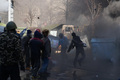 Сторонники оппозиции во время столкновений с сотрудниками милиции в центре Киева. Фото: Дмитрий Борко/Грани.Ру