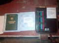Найденные в захваченной БМД вещи и документы. Фото: hromadske.tv