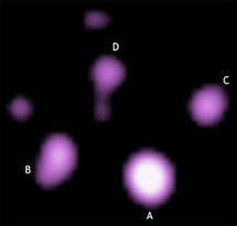 Трилистниковидный квазар (Cloverleaf quasar) в рентгеновских лучах. Фото NASA/CXC/Penn State/G.Chartas et al