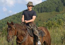 Путин на коне. Фото пресс-службы президента с сайта  Кремли.Ру
