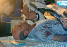 Раненый мужчина в эйлатском госпитале. Фото AP
